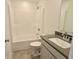 Clean bathroom offers a shower and tub combination and a modern vanity at 15925 Cobbs Crk Ln, Noblesville, IN 46060