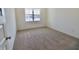 Bedroom with neutral carpet, a large window, and ample natural light at 15925 Cobbs Crk Ln, Noblesville, IN 46060