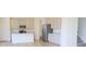 Modern kitchen with stainless steel appliances, granite countertops, and an island at 15925 Cobbs Crk Ln, Noblesville, IN 46060