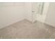Bright walk-in closet with neutral carpet and a view of a shower at 15925 Cobbs Crk Ln, Noblesville, IN 46060