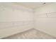 Walk-in closet equipped with wire shelving for optimal storage solutions at 15925 Cobbs Crk Ln, Noblesville, IN 46060