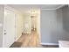 Hallway featuring a neutral gray tone and access to multiple rooms at 1640 W 7Th St, Anderson, IN 46016