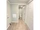 Spacious laundry room with washer hookups, a closet, and access to the bathroom with a toilet at 1640 W 7Th St, Anderson, IN 46016