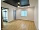 Bright bedroom featuring a barn door closet and ceiling fan with recessed lighting at 1716 E Kelly St, Indianapolis, IN 46203