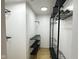 A walk-in closet with built-in shelving for clothes and storage at 1716 E Kelly St, Indianapolis, IN 46203