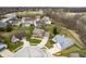 Aerial view of the home with a driveway, neighborhood surroundings and tree coverage at 17918 Lucas Cir, Westfield, IN 46074