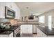 Updated kitchen with stainless steel appliances, white cabinets, and contrasting backsplash tiles at 17918 Lucas Cir, Westfield, IN 46074
