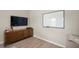 Cozy living area with stylish cabinet, television, and modern decor at 17918 Lucas Cir, Westfield, IN 46074