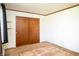 Neat bedroom with a closet and a neutral wall color at 1821 E Stop 10 Rd, Indianapolis, IN 46227