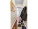 Entryway hallway featuring hardwood flooring, coat, shoes and interior door at 18358 Benton Oak Dr, Noblesville, IN 46062