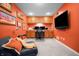 Bright home office with custom cabinets, desk space, and a comfortable seating area at 18358 Benton Oak Dr, Noblesville, IN 46062