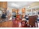 A kitchen with updated stainless appliances, granite countertops, and dining area at 18358 Benton Oak Dr, Noblesville, IN 46062