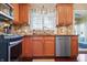 Updated kitchen featuring stainless steel appliances, hardwood floor and granite countertops at 18358 Benton Oak Dr, Noblesville, IN 46062