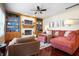Inviting living room with fireplace, built-in shelving and a comfortable sofa at 18358 Benton Oak Dr, Noblesville, IN 46062