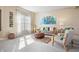 Cozy living room with neutral tones, stylish furniture, and plenty of natural light, perfect for relaxation at 18358 Benton Oak Dr, Noblesville, IN 46062