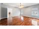 Large bedroom with hardwood floors, ceiling fan, and plenty of natural light at 1975 Westminster Pl, Columbus, IN 47201