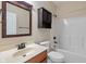 Bathroom showcasing a vanity, toilet, shower with storage cabinet, and towel rack at 2091 Banburry Pl, Avon, IN 46123