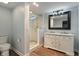 Modern bathroom featuring a double vanity with marble countertop and a glass enclosed shower at 2091 Banburry Pl, Avon, IN 46123