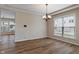Dining room featuring hardwood floors, recessed lighting, and a large window at 2091 Banburry Pl, Avon, IN 46123