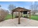 Backyard patio featuring a covered area with an outdoor television for entertainment and relaxation at 2091 Banburry Pl, Avon, IN 46123