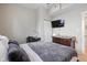 Bedroom features a TV, desk, closet, and dresser, providing ample space for both relaxation and productivity at 2155 S Delaware St, Indianapolis, IN 46225