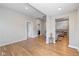 Open living area with hardwood floors offering ample space and seamless flow to other areas at 2155 S Delaware St, Indianapolis, IN 46225