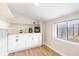 Functional room featuring white cabinets, ample counter space, and a bright window at 2155 S Delaware St, Indianapolis, IN 46225