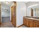 Bathroom features a vanity with sink, and an open doorway to the bedroom at 2525 Sunderland Dr, Martinsville, IN 46151