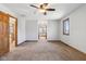 Bright bedroom with windows and doors leading to the bath and hallway at 2525 Sunderland Dr, Martinsville, IN 46151