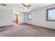 Neutral bedroom with windows and view to ensuite bath at 2525 Sunderland Dr, Martinsville, IN 46151