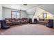 Spacious carpeted bonus room with large seating area and windows at 2525 Sunderland Dr, Martinsville, IN 46151