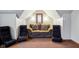 Carpeted bonus room featuring two couches with accent pillows at 2525 Sunderland Dr, Martinsville, IN 46151