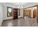 Dining room with hardwood floors, natural light, and wood trim at 2525 Sunderland Dr, Martinsville, IN 46151
