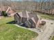 A beautiful brick two-story house featuring a spacious lot and a well-manicured lawn at 2525 Sunderland Dr, Martinsville, IN 46151