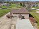 Two-story home featuring an attached two car garage and a large concrete driveway at 2525 Sunderland Dr, Martinsville, IN 46151