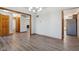 Living room with wood floors, wood trim, and neutral paint at 2525 Sunderland Dr, Martinsville, IN 46151