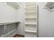 Organized walk-in closet with adjustable shelving and rod storage at 2525 Sunderland Dr, Martinsville, IN 46151
