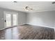 Large living room with french doors and new flooring at 2638 Calbert Dr, Indianapolis, IN 46219