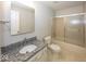 Clean bathroom featuring granite countertops and a shower-tub combo at 3013 Crimson W Ct # 42, Carmel, IN 46033