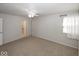 Light-filled bedroom with neutral walls and plush carpeting at 3013 Crimson W Ct # 42, Carmel, IN 46033
