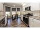 Well-lit kitchen featuring stainless steel appliances, granite countertops, and a kitchen island at 3013 Crimson W Ct # 42, Carmel, IN 46033