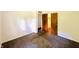 A comfortable bedroom includes neutral carpet and an open, convenient closet at 3201 N Hawthorne Ln, Indianapolis, IN 46218