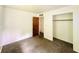 Cozy bedroom with neutral carpet and closet, freshly painted and move-in ready at 3201 N Hawthorne Ln, Indianapolis, IN 46218