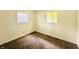 Sunlit bedroom with neutral carpet, bright windows, and fresh paint at 3201 N Hawthorne Ln, Indianapolis, IN 46218
