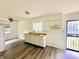 Eat-in kitchen features neutral paint, wood cabinets, and modern ceiling fan at 3201 N Hawthorne Ln, Indianapolis, IN 46218