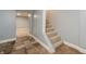 View of carpeted basement with stairs to upper level at 350 N Belleview Pl, Indianapolis, IN 46222