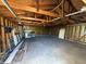 Unfinished garage ready for customization and featuring exposed wooden framing at 350 N Belleview Pl, Indianapolis, IN 46222