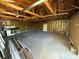 Unfinished garage ready for customization and featuring exposed wooden framing at 350 N Belleview Pl, Indianapolis, IN 46222