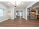 Well-lit living area showcasing open layout and connectivity to the kitchen at 350 N Belleview Pl, Indianapolis, IN 46222