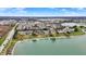 Stunning aerial view of waterfront homes with private docks on a picturesque lake at 4703 River Ridge Dr, Indianapolis, IN 46240